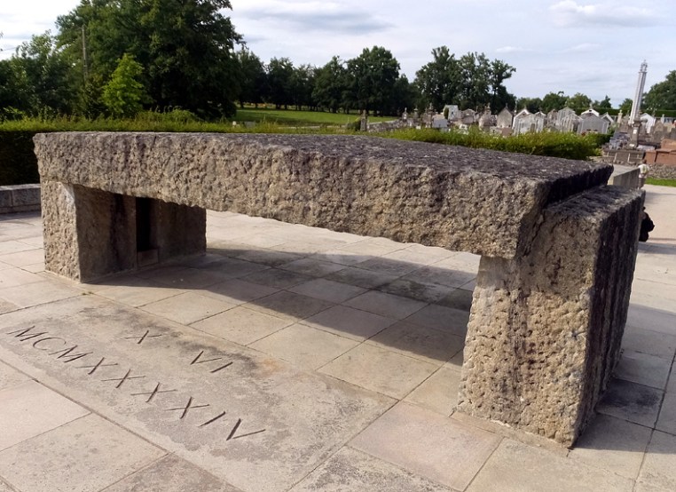 The victims are regarded by the people of France as martyrs to the cause of peace and freedom everywhere. The roman numerals spell "10 June, 1944." This was four days after the D-Day landings. In less than a year, Germany surrendered and the coward Hitler committed suicide.