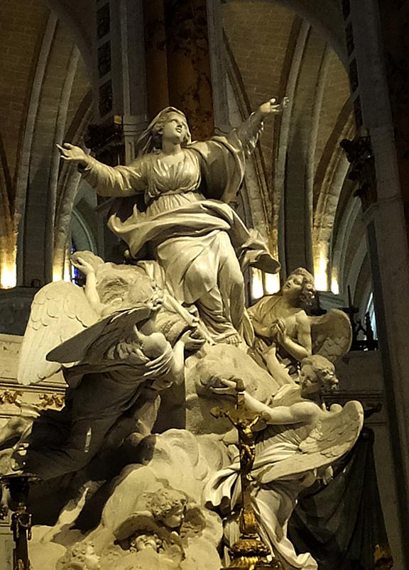 The enormity and beauty of the sculpture at the high altar is compelling. It can be seen even from the back of this vast cathedral. "The Assumption of Mary" by Charles-Antoine Bridan bids visitors down the long central nave and rewards them with a beatific view of the Divine Feminine--arms flung wide, supported by the hosts of heaven.