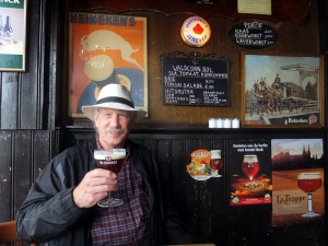 Charlie at a brown cafe, so called because of the walls covered by years of tobacco staining. No smoking inside anymore. 