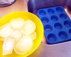 We take ice for granted but it is not a common thing in Europe. Before we bought our own ice trays, we used a flexible muffin pan to make "Ice Muffins."