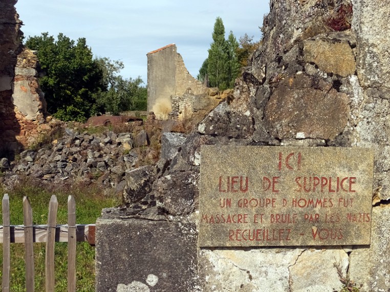Each of the murder sites is marked by a stone plaque like this one.