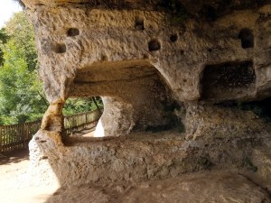 The holes are where timber joists were inserted to create multiple floors.