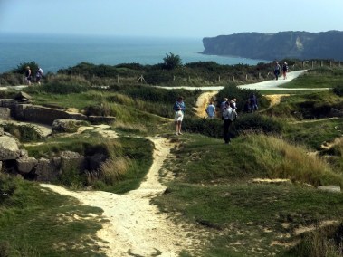 Bomb craters from the pre-assault "softening up" are still visible at Point du Hoc.