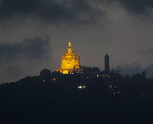 At night, the view changed completely. The Church of the Sacred Heart of Jesus on Mount Tibidabo glowed through the distance and passing clouds.
