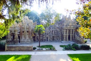 The east facade features the three giants of humanity on the left and Egyptian columns on the right.