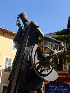 This modern statue commemorates Nostradamus as an astrologer, author, translator, prophet, and physician (known especially for treating plague victims).