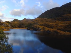 The park is about 40 square miles of lakes, woodlands, and mountain peaks. At this altitude, the lush green for which Ireland is famous had turned to gold with the coming of autumn.