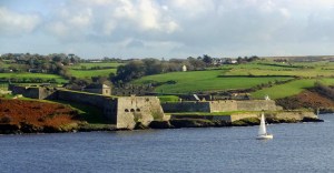 Charles Fort stands guard over the entrance to Kinsale's harbor. It is a star fort, so named because the bastions form a star shape for improved defensive capabilities. Anyone approaching the walls would be caught in a crossfire.