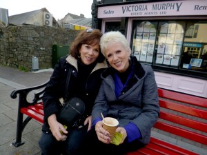 Here Sarah and her sister Deas, visiting from Florida, enjoy rest and refreshment in the square.