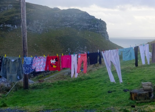 Somehow, this clothesline seems to tie together modern elements like Mickey Mouse with an ancient way of life.