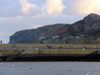 Beyond Howth's harbor is the rocky promentory known as Howth Head.
