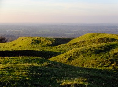 At first, it appears that there is not much at all on the hill, but a map of the site will reveal that these rolling hills are the remains of ring forts and enclosures of various kinds.
